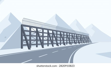 Snowy mountain road landscape featuring a large metal crash barrier for winter road safety and traffic control.