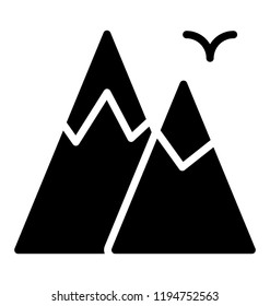 Snowy mountains in evening 
