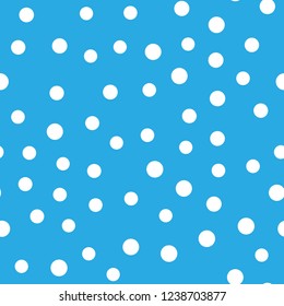 Snowy seamless patern. White dot snowflakes on blue background. Snow and Christmas theme. Abstract backround.