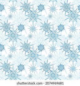 Patrón ininterrumpido de navidad de invierno con nieve, copo de nieve azul sobre fondo blanco, ornamento simétrico de cristal