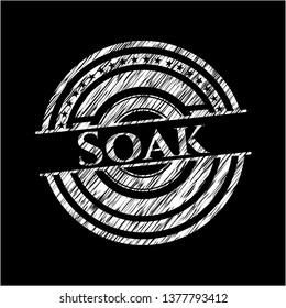 Soak chalk emblem written on a blackboard