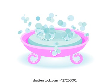 soap. Blue soap and soap bubbles in a pink soap tray
