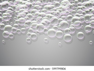 Soap bubbles background with rainbow colored airy foam