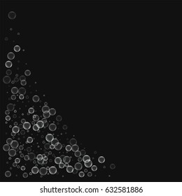 Soap bubbles. Bottom left corner with soap bubbles on black background. Vector illustration.