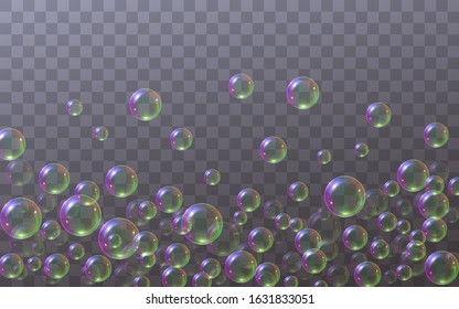 Soap bubbles located below isolated on a transparent background. Flying falling soap bubbles with rainbow reflection. Texture elements for design, laundry concept, dry cleaning.