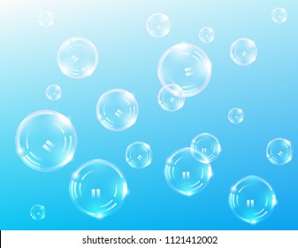 Soap bubbles on blue background