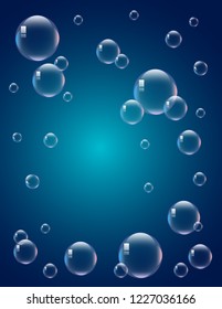 Soap bubbles on blue background