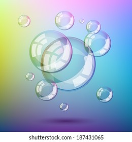 Soap bubbles on colorful background. Contains transparency.