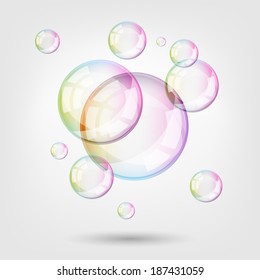 Soap bubbles on light background. Contains transparency.