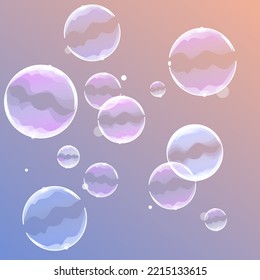 Soap bubbles on a pink blue background