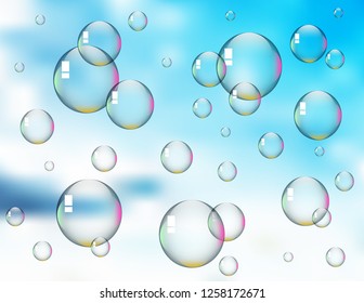 Soap bubbles on sky background