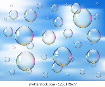 Soap bubbles on sky background