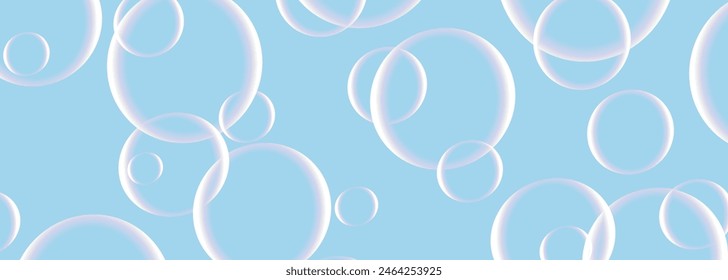 Soap bubbles on wide background in blue pastel colors. Realistic 3d transparent bubbles on vector illustration wide banner.