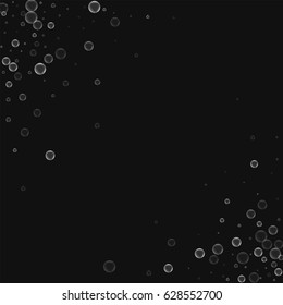 Soap bubbles. Scatter abstract corners with soap bubbles on black background. Vector illustration.