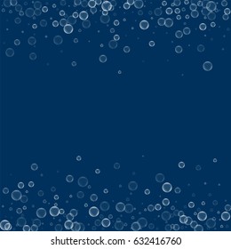 Soap bubbles. Scattered border with soap bubbles on deep blue background. Vector illustration.