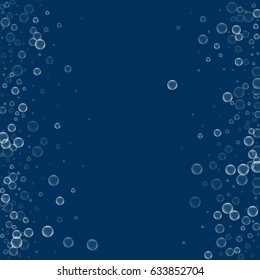 Soap bubbles. Scattered frame with soap bubbles on deep blue background. Vector illustration.