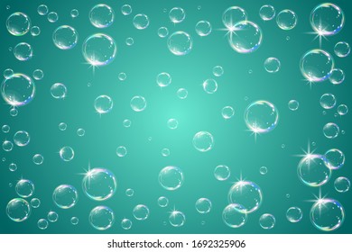 Soap bubbles sparkling on a turquoise background.