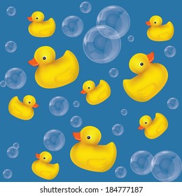 soap bubbles and yellow rubber ducks on blue  background. 