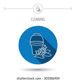 Soapy cleaning icon. Bucket with foam and bubbles sign. Blue flat circle button. Linear icon with shadow. Vector