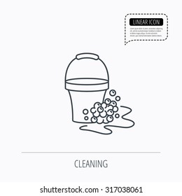 Soapy cleaning icon. Bucket with foam and bubbles sign. Linear outline icon. Speech bubble of dotted line. Vector