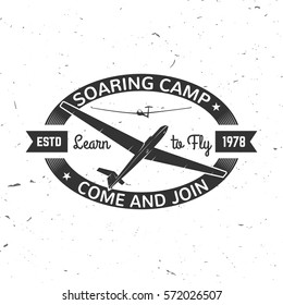 Soaring camp retro badge. Concept for shirt, print, seal, overlay or stamp. Typography design- stock vector. Soaring camp design with gliders silhouette.