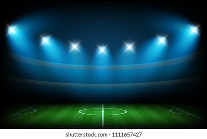 Arena de fútbol iluminada con luces puntuales
