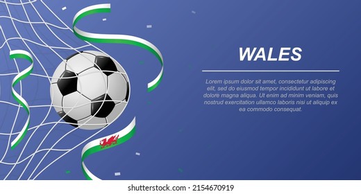 Soccer background with flying ribbons in colors of the flag of Wales. Realistic soccer ball in goal net.