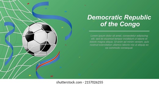 Soccer background with flying ribbons in colors of the flag of DR Congo. Realistic soccer ball in goal net.