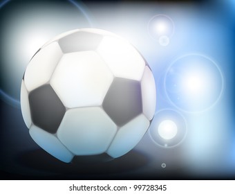 Soccer ball in the floodlights and bright highlights on a blue background