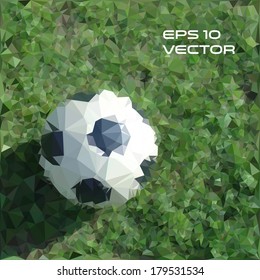 Soccer ball in grass field. Football background made with triangles. Low-poly vector design.