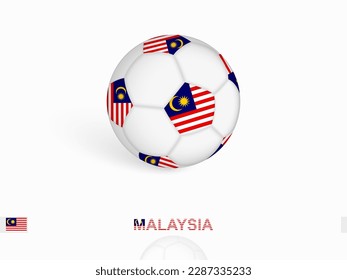 Soccer ball with the Malaysia flag, football sport equipment. Vector illustration.