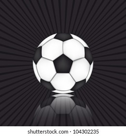 Soccer ball on black background