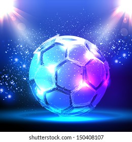 Soccer ball on blue spotlight