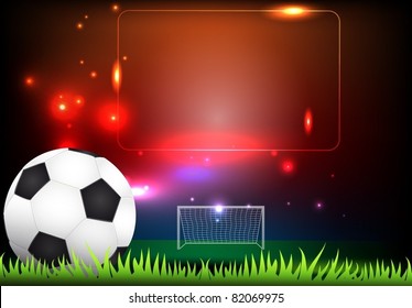Soccer ball on grass against stadium
