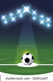 Soccer ball on grass background