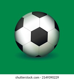 Soccer ball on a green background. Vector illustration.