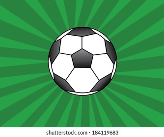 Soccer ball on the green grass background