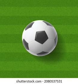 Soccer ball on green striped grass background. Vector abstract football poster