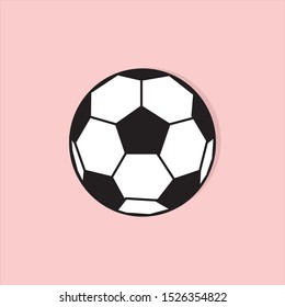 Soccer ball on pink background