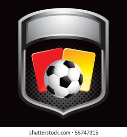 soccer ball with red and yellow cards on silver display
