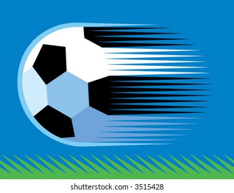a soccer ball speeding over grass