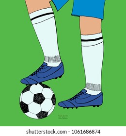 Soccer ball under player feet on green background. Hand drawn color sketch. Sport collection color vector illustration