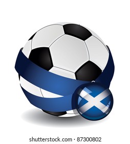 Soccer ball wrapped in medal strap and badge with flag of Scotland
