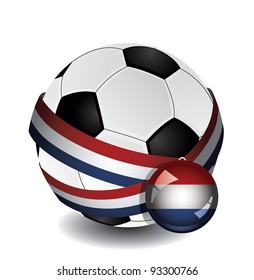 Soccer ball wrapped in medal strap and badge with flag of Netherlands