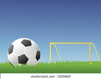 Soccer ball/Football in a green grassy field with a goalpost