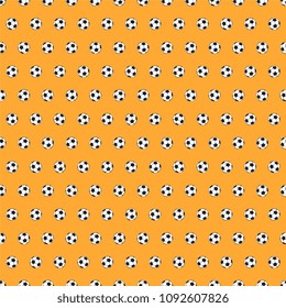 soccer balls on orange background seamless pattern