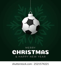 soccer Christmas Greeting card. Merry Christmas and happy new year sport greeting card. Hang on a thread green and red xmas ball bauble on green on background. Sport Vector illustration.