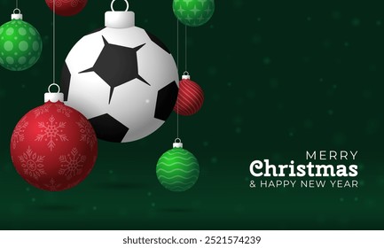 soccer Christmas Greeting card. Merry Christmas and happy new year sport greeting card. Hang on a thread green and red xmas ball bauble on green on background. Sport Vector illustration.