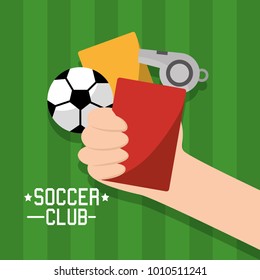 soccer club hand holding cards red and yellow ball whistle