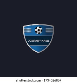 Soccer emblem logo with shielding elements and ball icons.